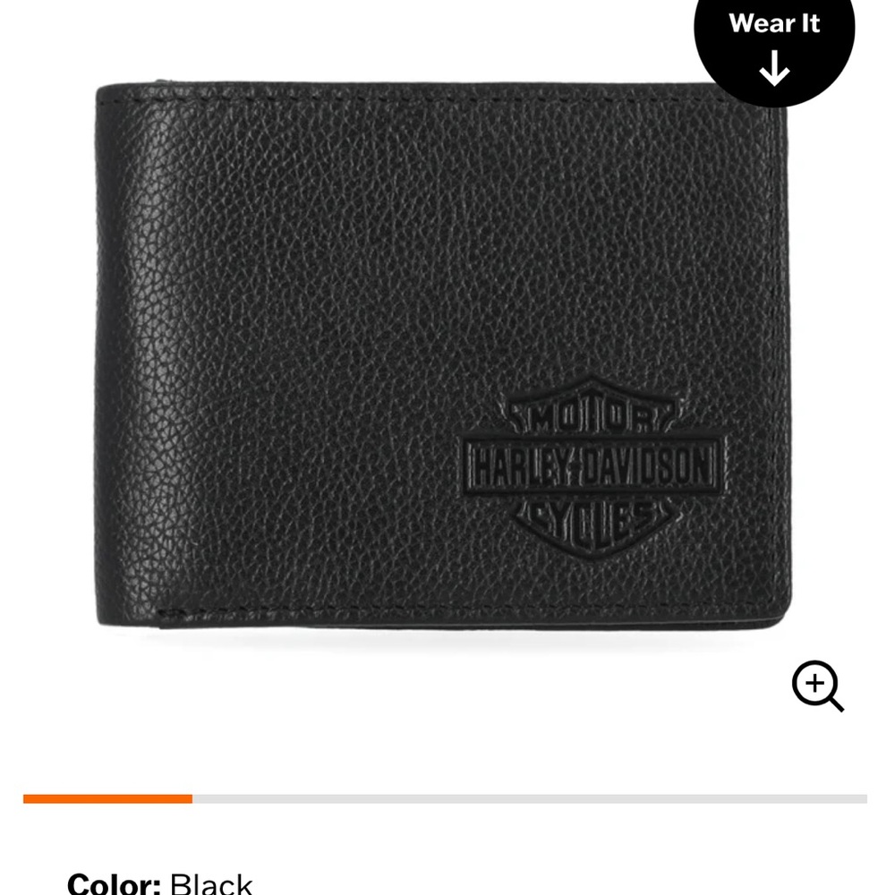 Black brand new harley davidson wallet still in packaging.
